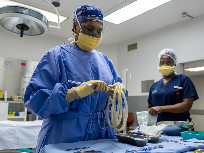 Volunteer supporting clinical staff in Mwanza