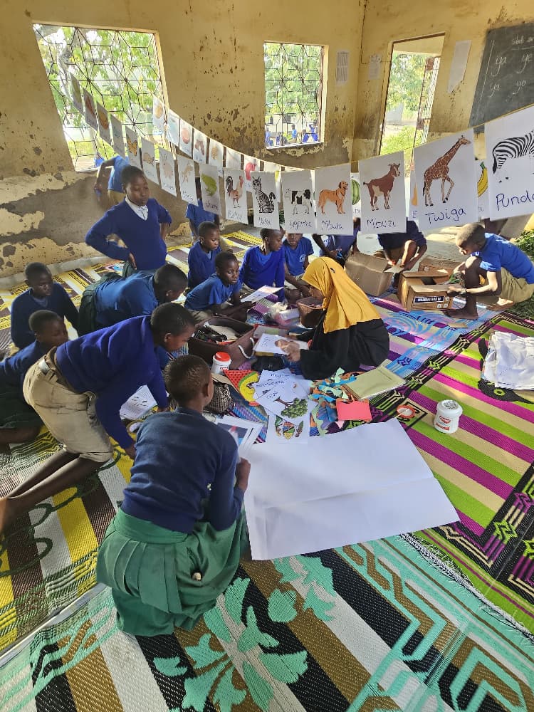 Children taking part in a learning activity in Mwanza